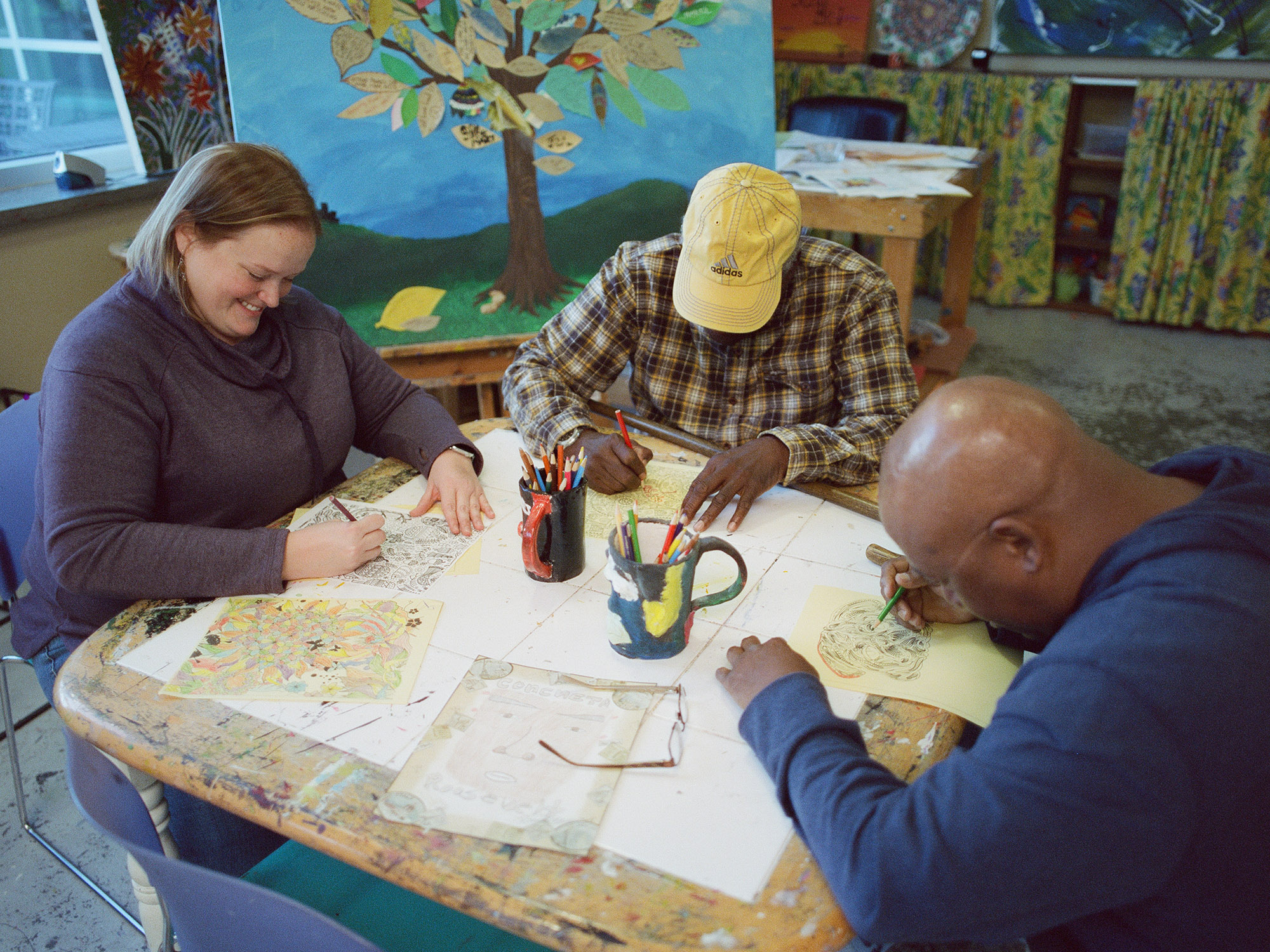 People using art supplies