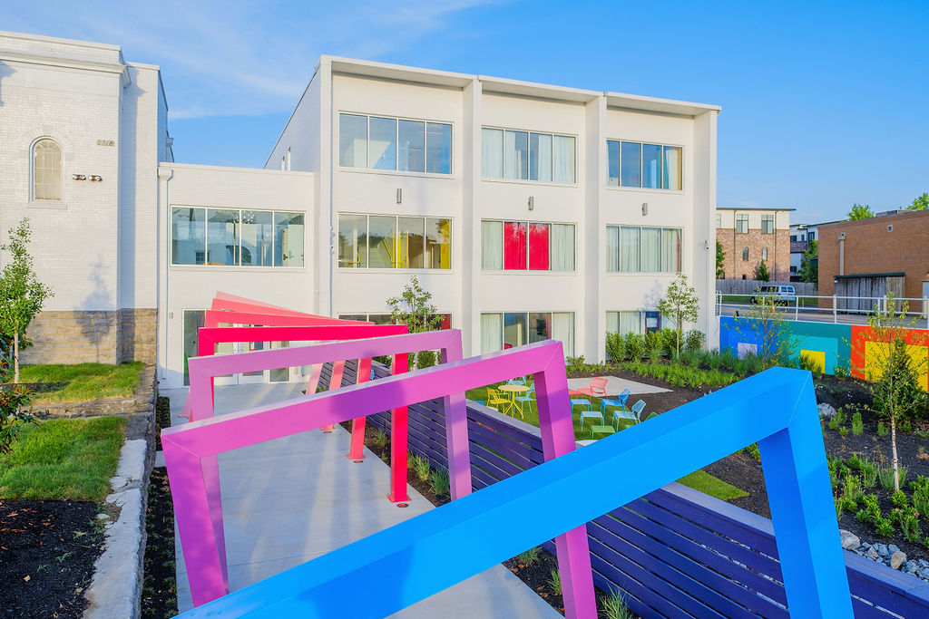 The Gallatin lobby featuring a colorful Stay Joyful mural